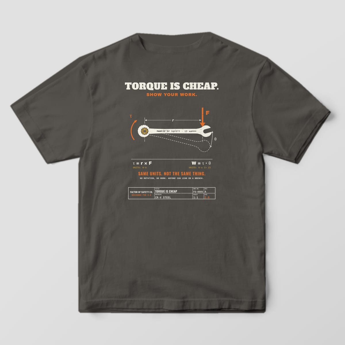 Back of a pepper Comfort Colors 1717 tee with the large Torque Is Cheap Show Your Work print: a cream combination wrench on a brass bolt with orange force and torque arrows.