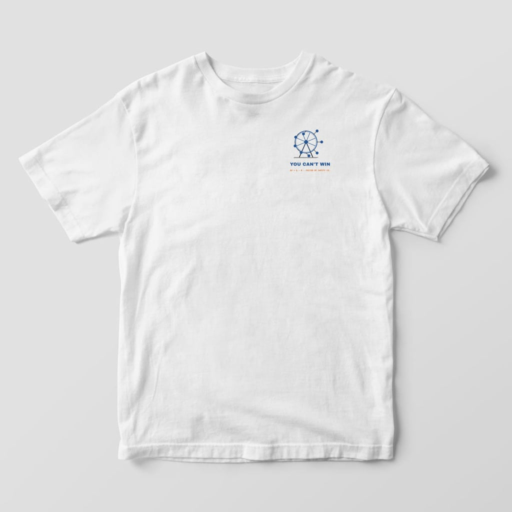Front of a white Comfort Colors 1717 tee with a small perpetual motion wheel on the left chest.