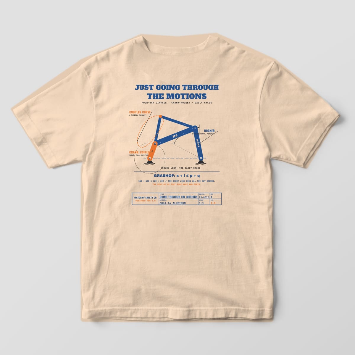 Back of an ivory Comfort Colors 1717 tee with the large Just Going Through the Motions print: a blue and orange four-bar linkage with a dashed orange coupler curve.