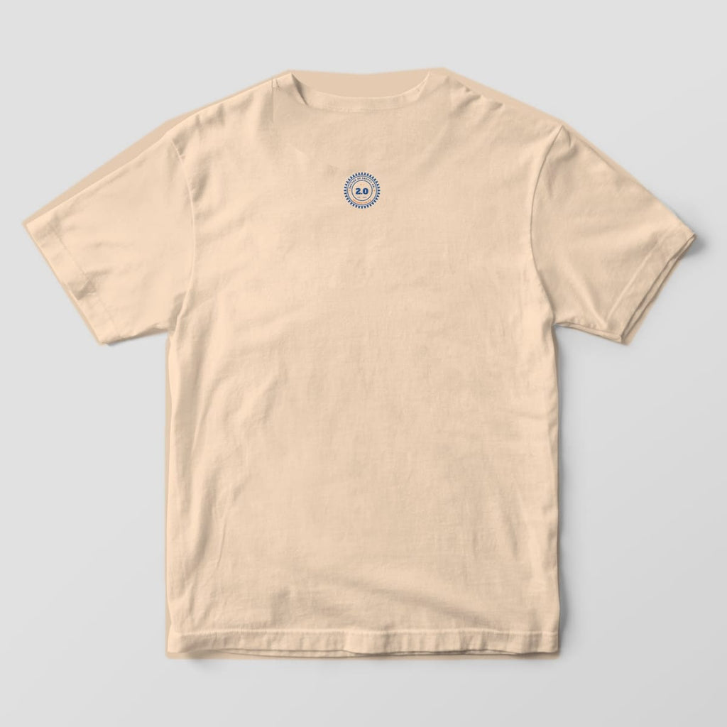 Back of an ivory Comfort Colors 1717 tee with a small round gear seal neck print below the collar.