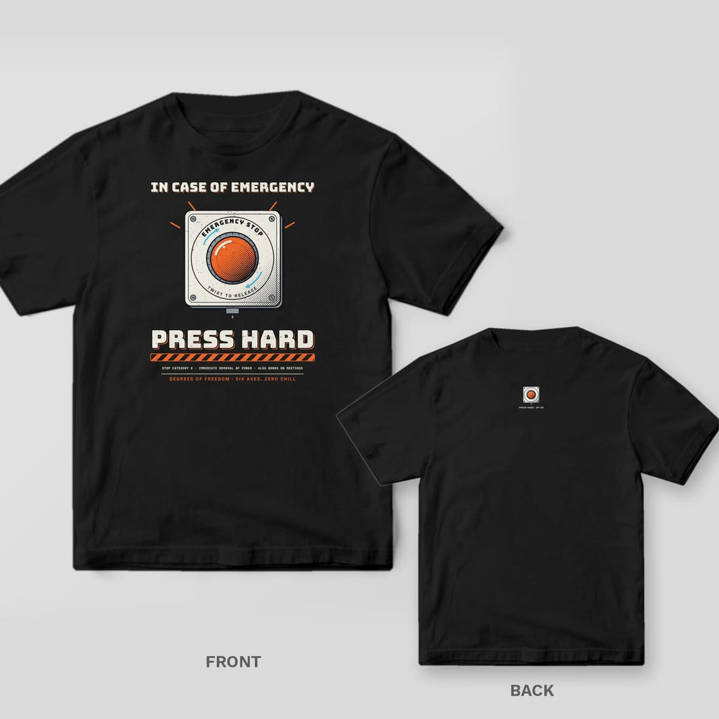 Black tee shown front and back: front has a large orange emergency stop button under In Case of Emergency with Press Hard below; back has a small e-stop at the neck.