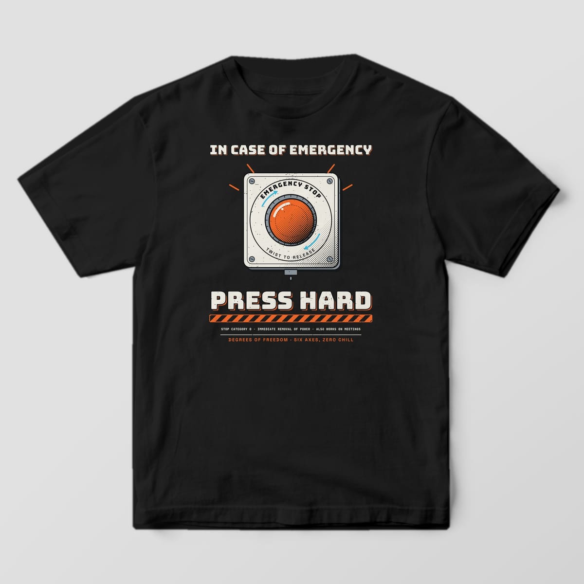 Front of a black Comfort Colors 1717 tee with a large emergency stop button with In Case of Emergency and Press Hard lettering.