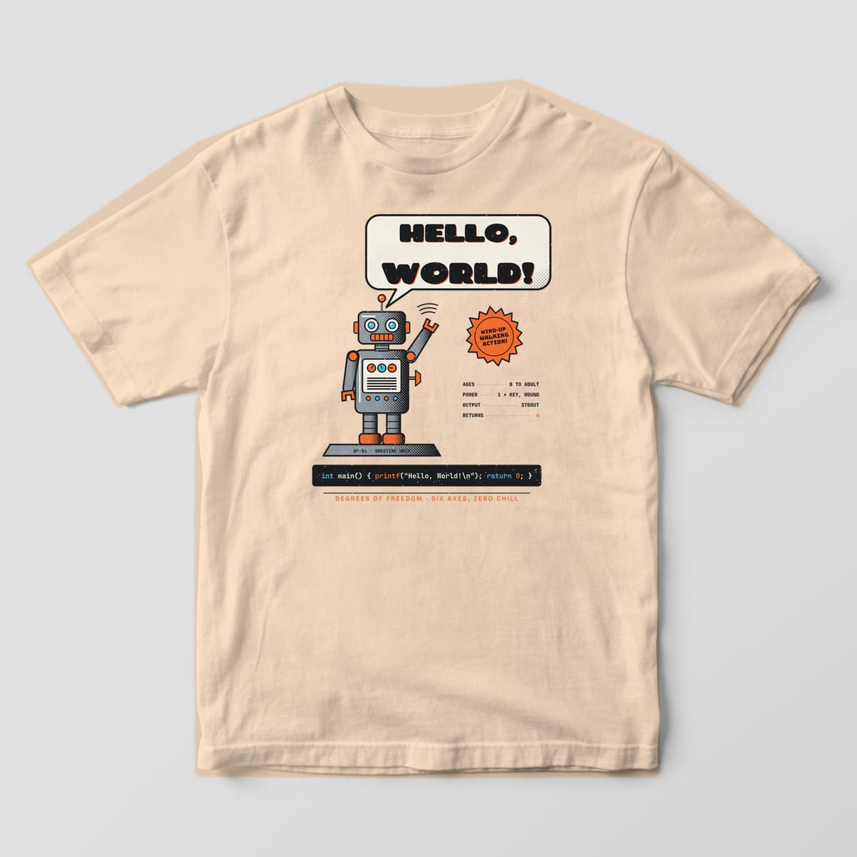 Front of an ivory Comfort Colors 1717 tee with a large waving tin robot and Hello, World! speech bubble.