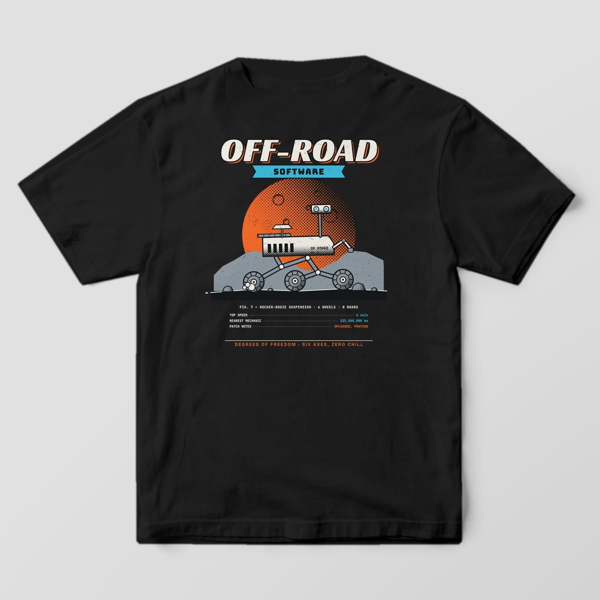 Back of a black Comfort Colors 1717 tee with a six-wheel rover, an orange halftone planet and Off-Road Software lettering.