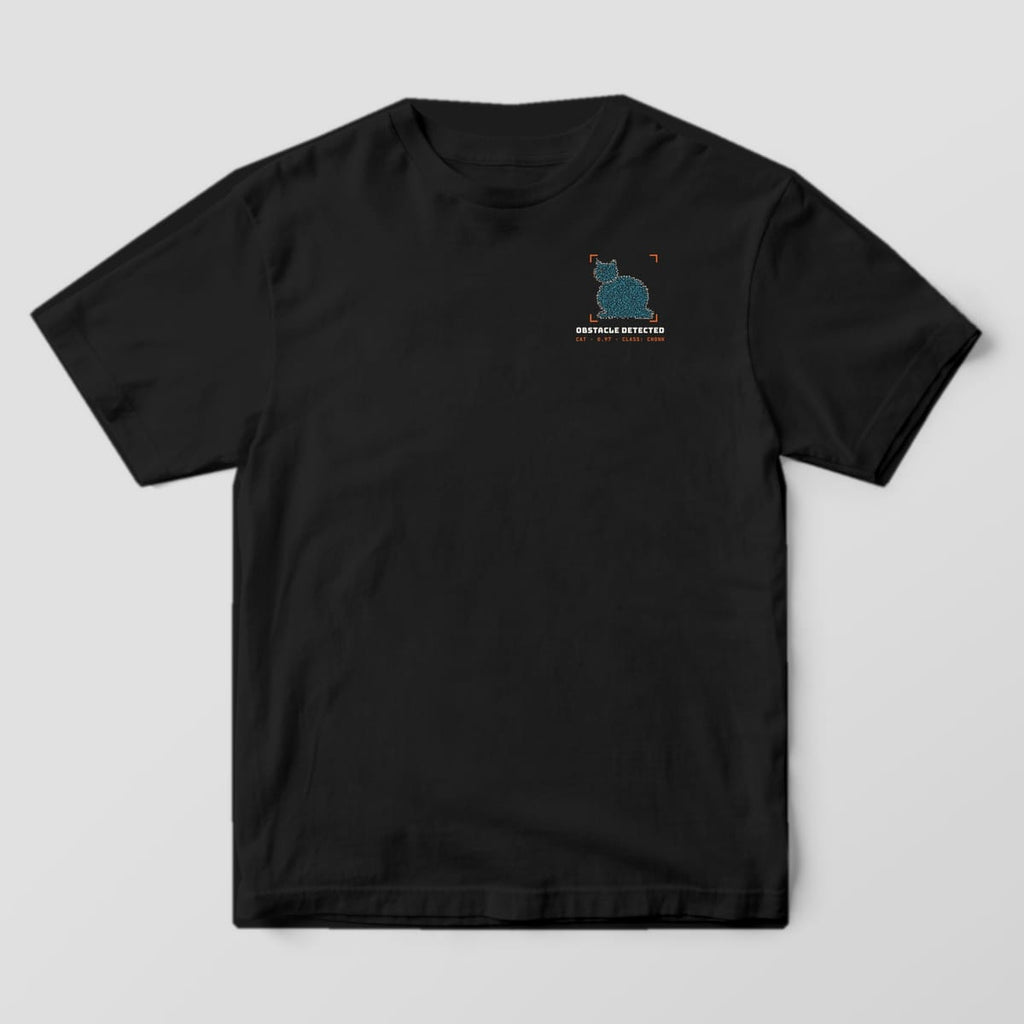 Front of a black Comfort Colors 1717 tee with a small chonky point-cloud cat in detection corners on the left chest.