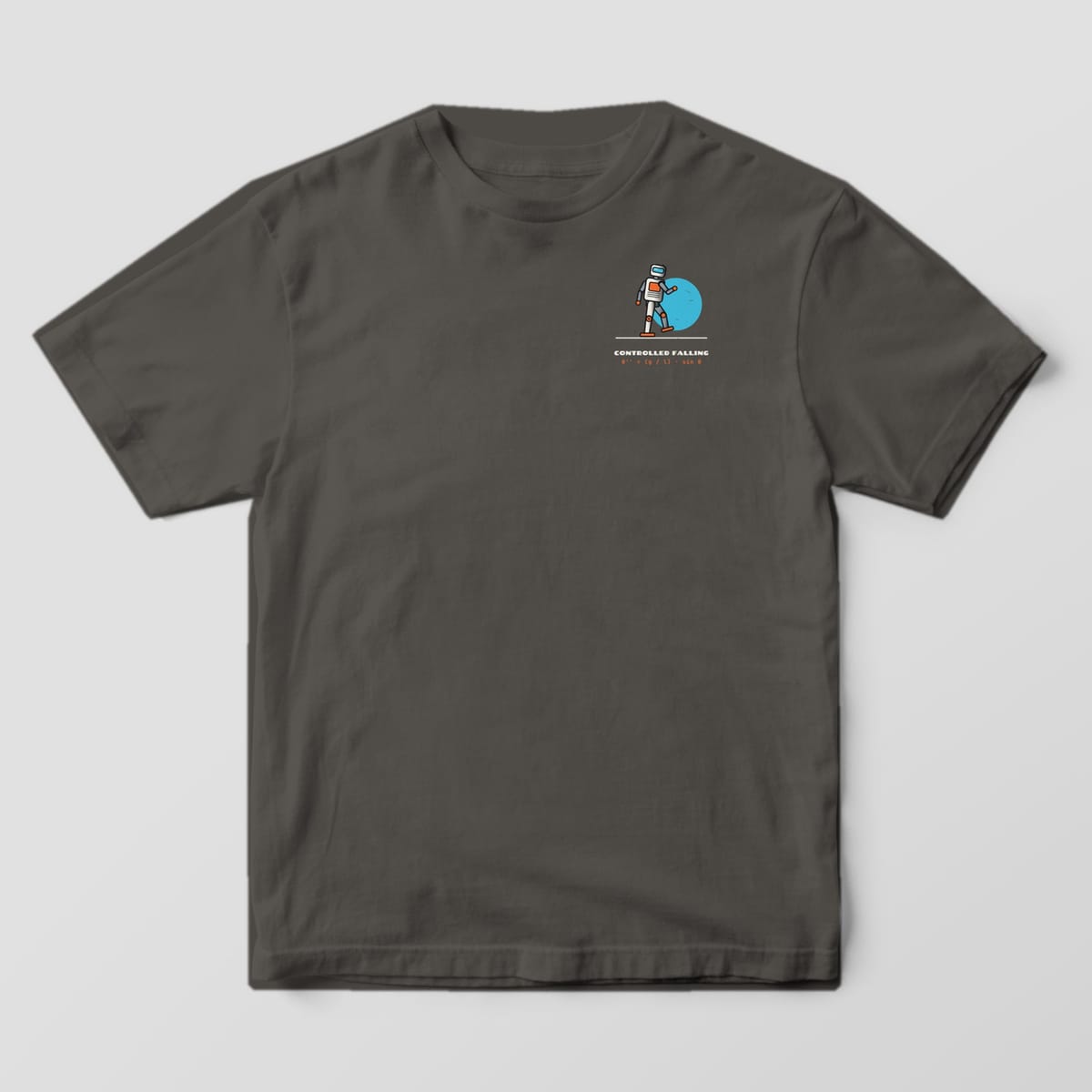 Front of a pepper Comfort Colors 1717 tee with a small walking robot in front of a cyan planet on the left chest.
