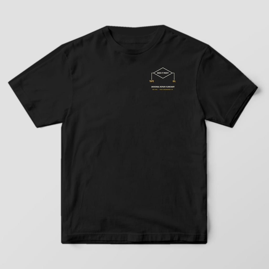 Front of a black Comfort Colors 1717 tee with a small Does It Move flowchart diamond on the left chest.