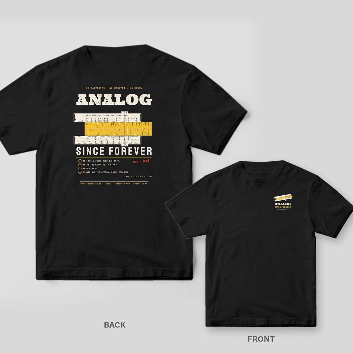 Black tee shown back and front: back has a cream and yellow slide rule with real log scales between the words Analog and Since Forever; front has a small slide rule and the word Analog.