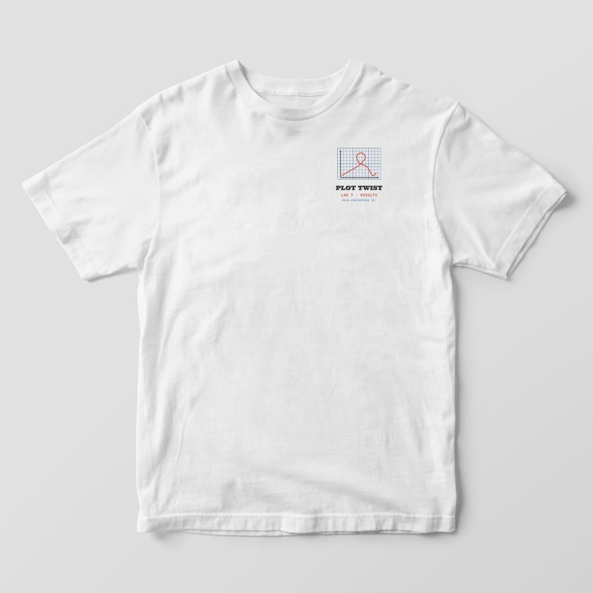 Front of a white Comfort Colors 1717 tee with a small graph with a looping red line on the left chest.