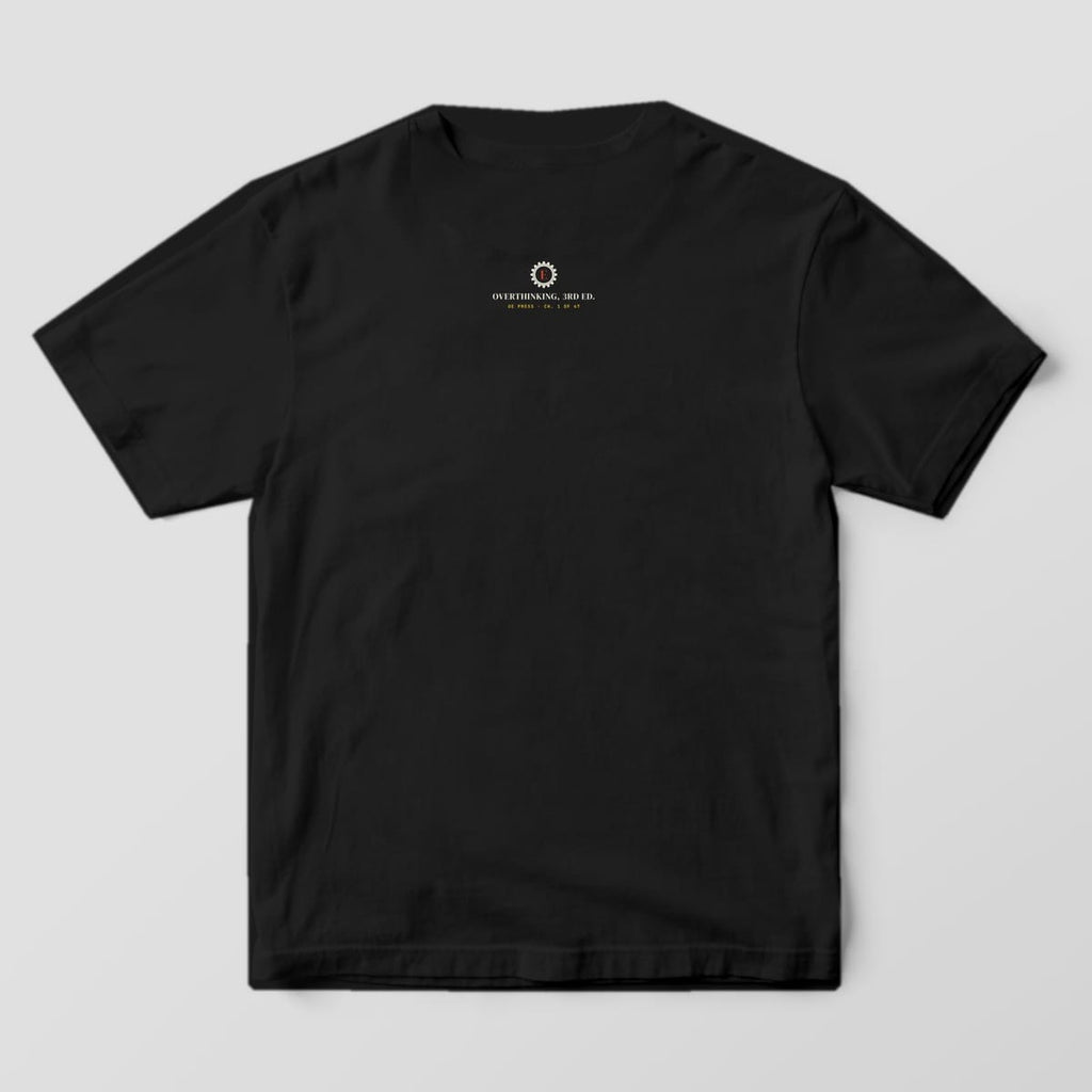Back of a black Comfort Colors 1717 tee with a small gear monogram neck print below the collar.