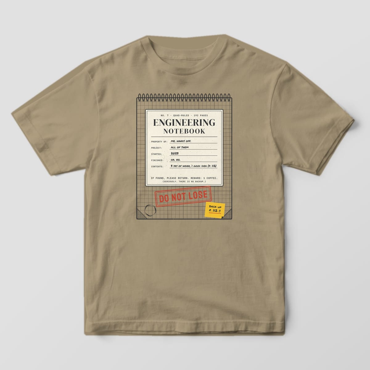 Front of a khaki Comfort Colors 1717 tee with a full-front spiral engineering notebook cover with a red Do Not Lose stamp.