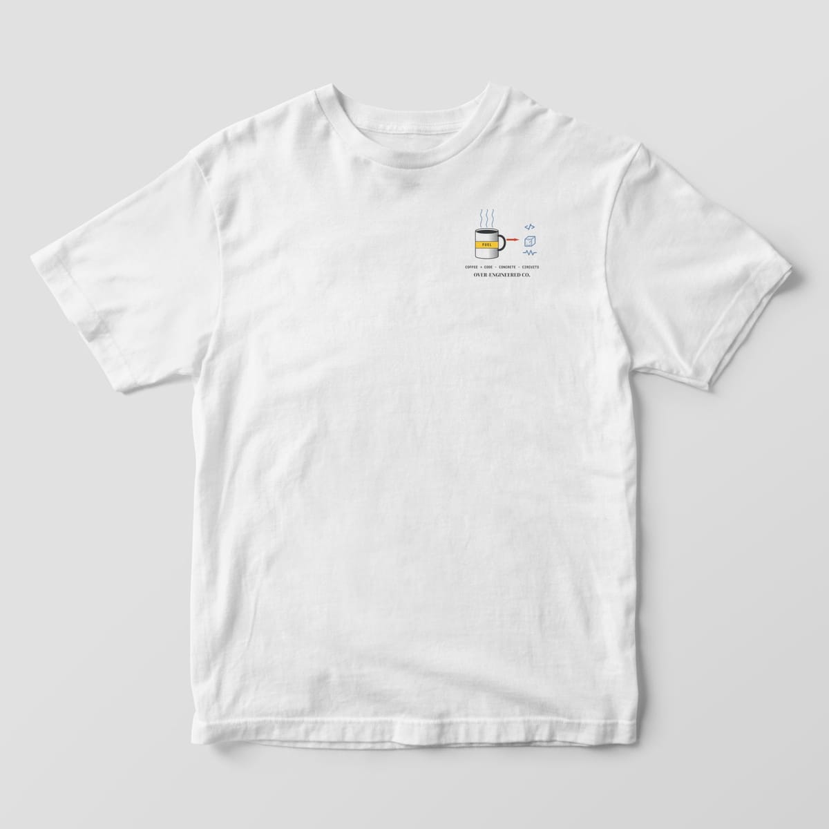 Front of a white Comfort Colors 1717 tee with a small coffee mug with code, concrete and circuit icons on the left chest.