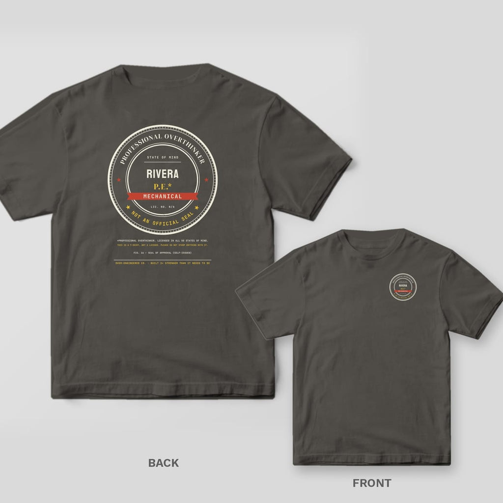 Pepper tee shown back and front: back has a large round Professional Overthinker seal with the sample name RIVERA and MECHANICAL; front has a small round seal with the name RIVERA.