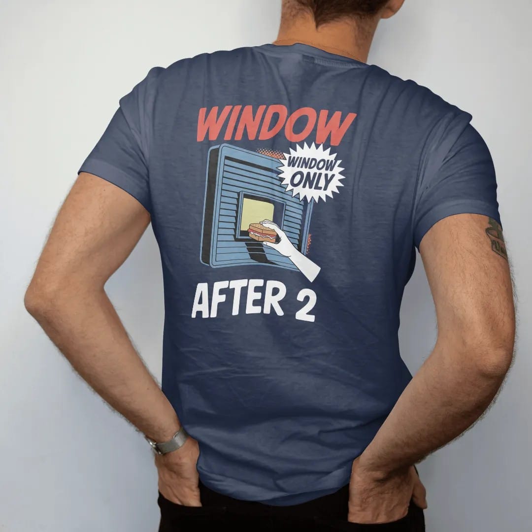 Man wearing a Navy tee, seen from the back: a glowing service window in a metal gate with a hand passing out a sandwich, signed Window Only and After 2, in halftone comic-pop red, yellow and cream.