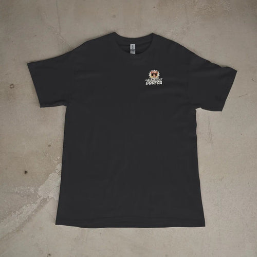 Front of a Black tee laid flat, with the small Late Night Bodega logo on the left chest.