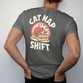 Man wearing a Pepper tee, seen from the back: an orange cat asleep on bread loaves with floating z's under Cat Nap and Shift, in halftone comic-pop red, yellow and cream.