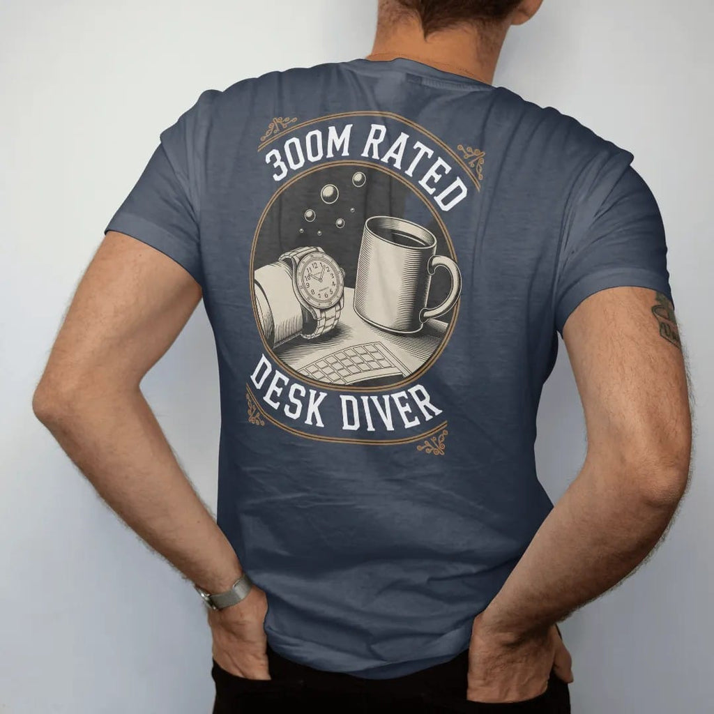 Man wearing a Midnight tee, seen from the back: a dive watch on a wrist resting on a keyboard beside a mug with floating bubbles, under 300M Rated and Desk Diver, as a fine engraving in antique gold and cream.