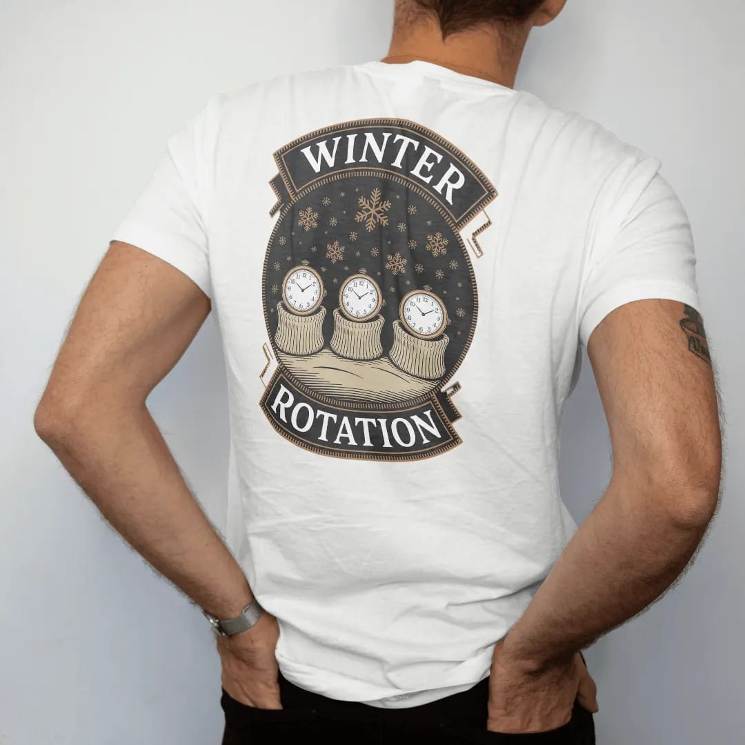 Man wearing a White tee, seen from the back: three watches peeking from sweater cuffs in a row with falling snowflakes, under Winter and Rotation, as a fine engraving in antique gold and cream.