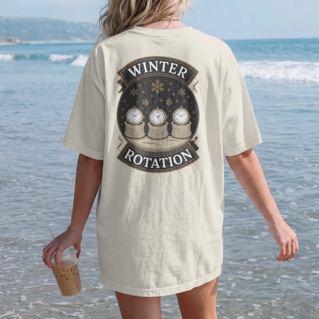 Woman on the beach in a Ivory tee, back view: three watches peeking from sweater cuffs in a row with falling snowflakes, under Winter and Rotation, as a fine engraving in antique gold and cream.