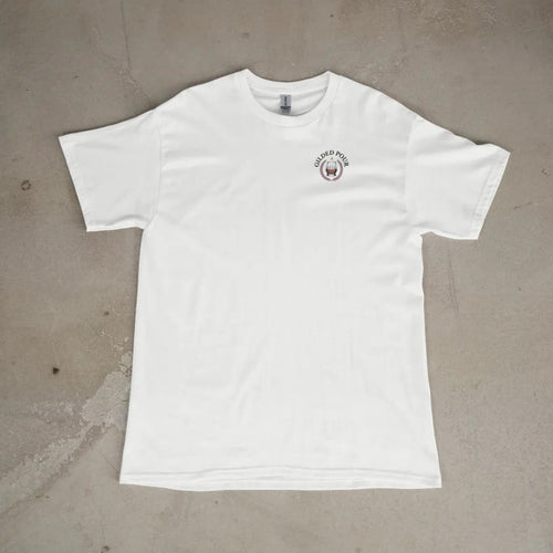 Front of a White tee laid flat, with the small Gilded Pour logo on the left chest.