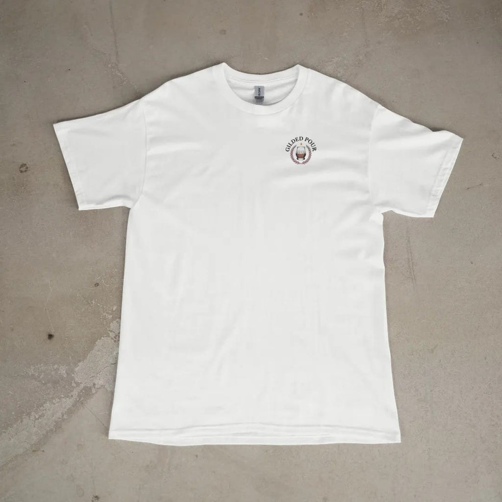 Front of a White tee laid flat, with the small Gilded Pour logo on the left chest.