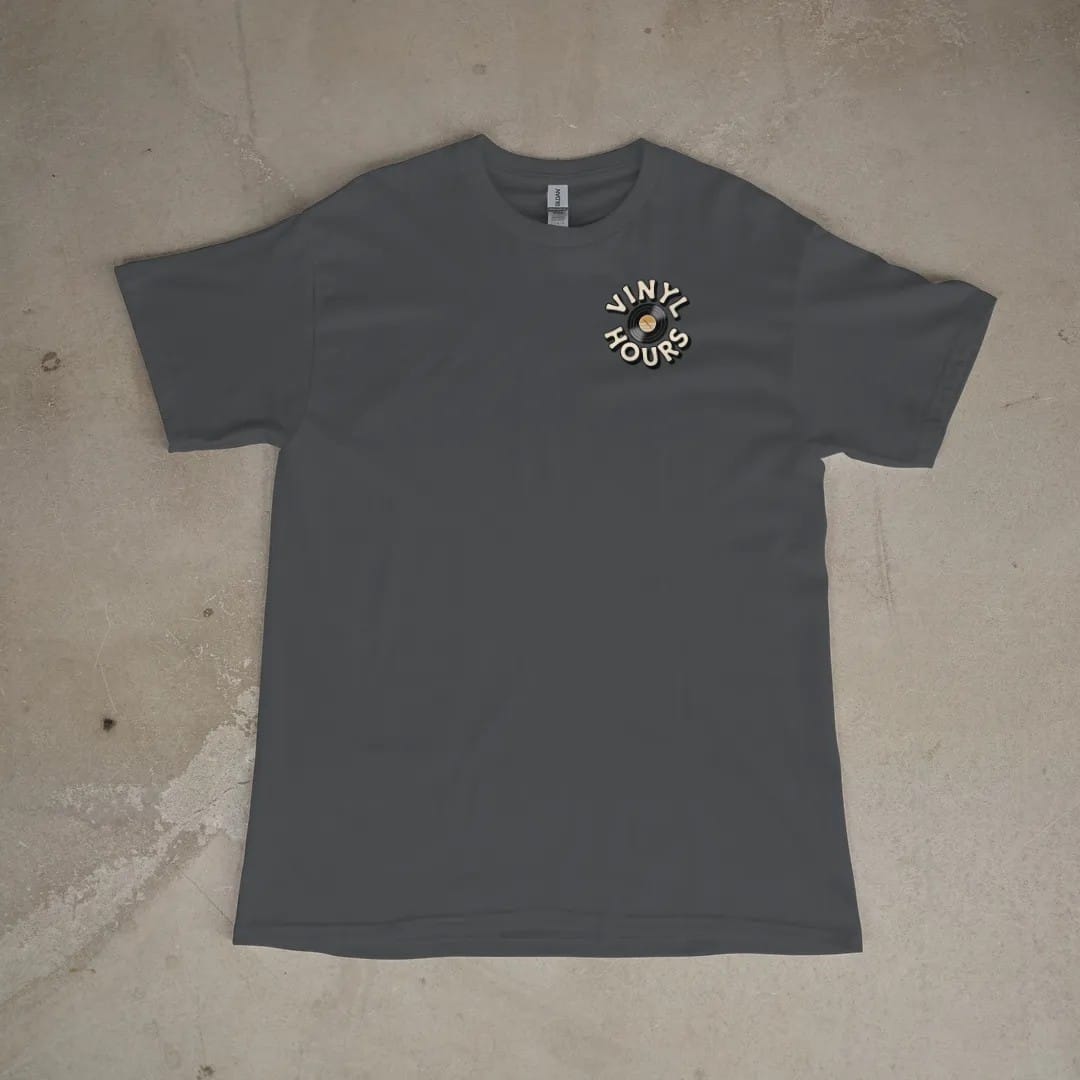 Front of a Graphite tee laid flat, with the small Vinyl Hours logo on the left chest.