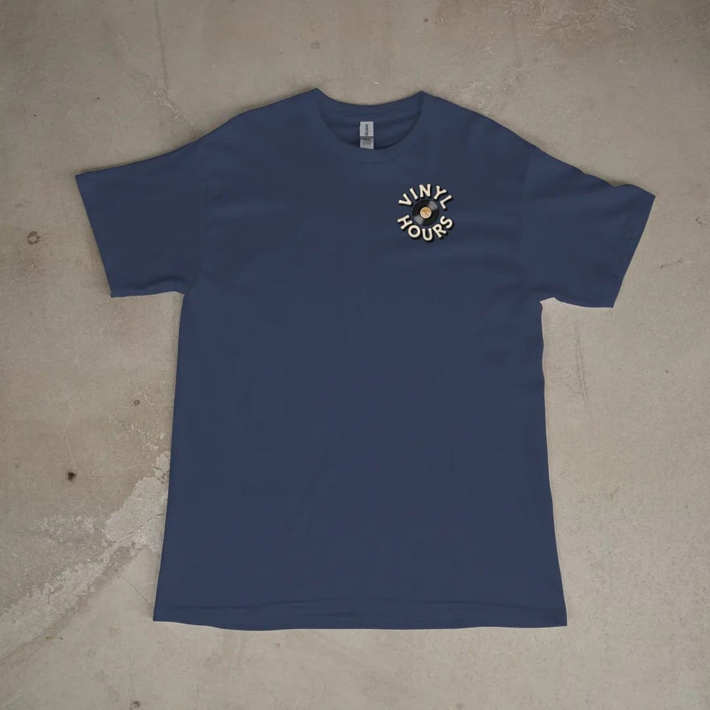 Front of a Navy tee laid flat, with the small Vinyl Hours logo on the left chest.