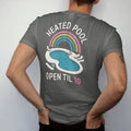Man wearing a Pepper tee, seen from the back: a kidney-shaped motel pool from above with loungers and a diving board, with "HEATED POOL" and "OPEN TIL 10" in neon-tube script and small 70s caps, printed in faded, cracked cream, mustard and…