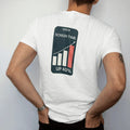 Man wearing a White tee, seen from the back: minimal single-line drawing of a phone outline with a simple rising bar graph on the screen, with "SCREEN TIME / UP 40%" in small spaced-out caps, printed in bone white with a low-battery red accent on…