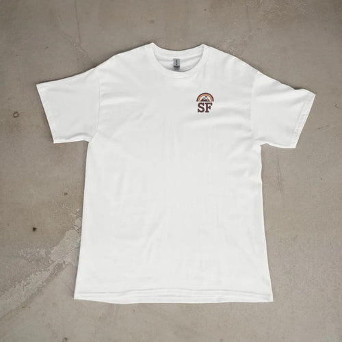 Front of a White tee laid flat, with the small Summit Fever logo on the left chest.