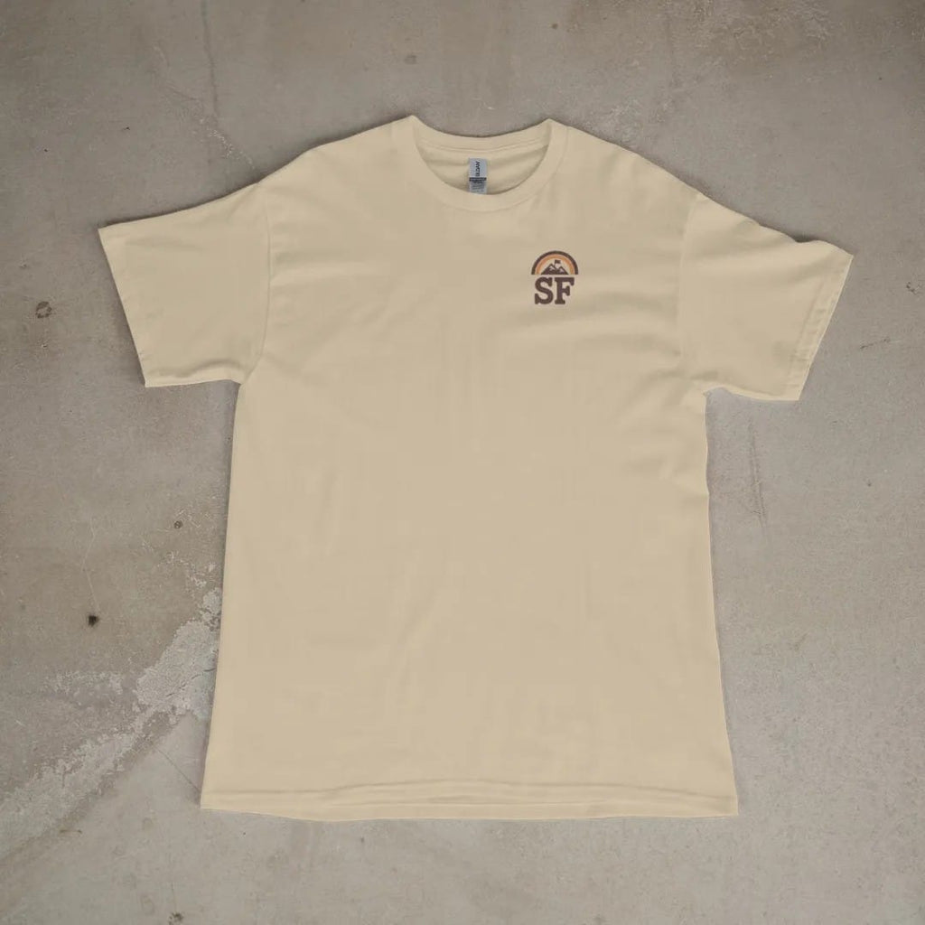 Front of a Sandstone tee laid flat, with the small Summit Fever logo on the left chest.