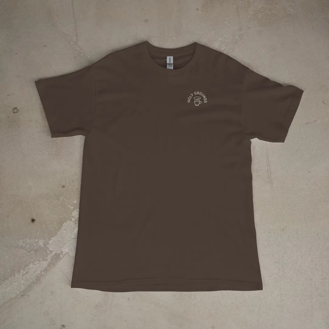 Front of a Espresso tee laid flat, with the small Holy Grounds logo on the left chest.