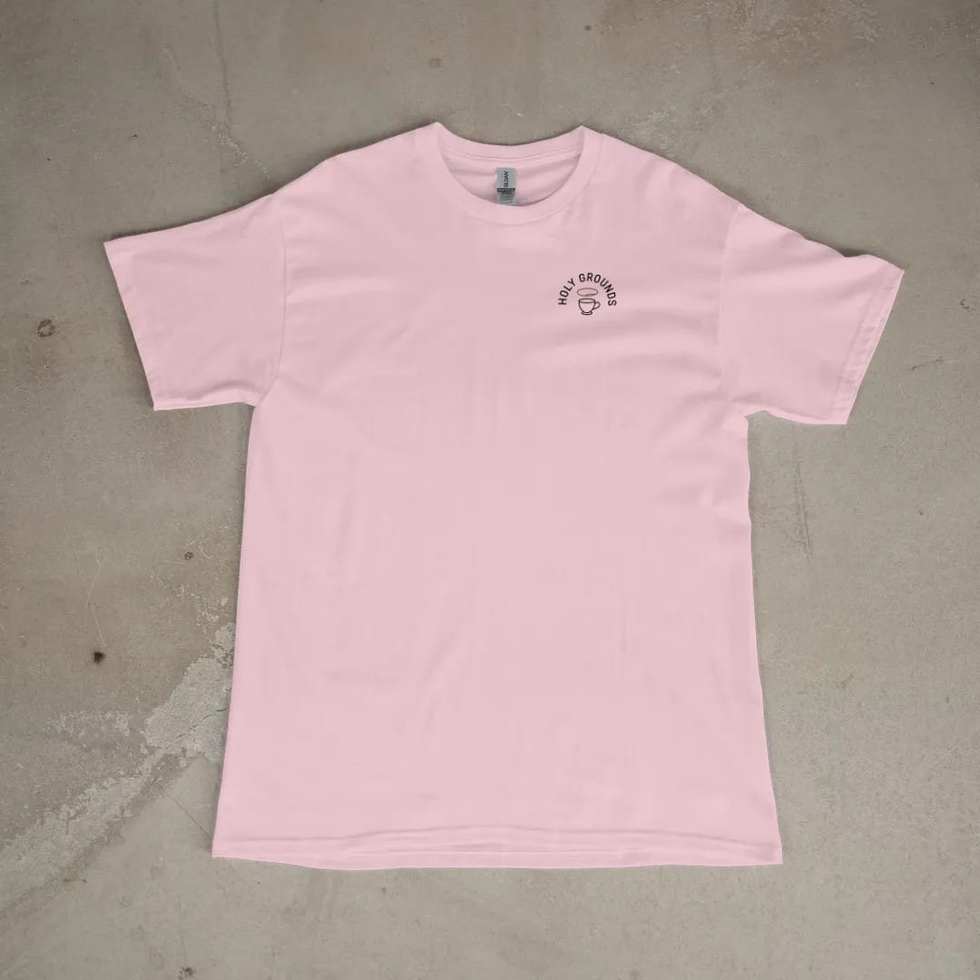 Front of a Blossom tee laid flat, with the small Holy Grounds logo on the left chest.