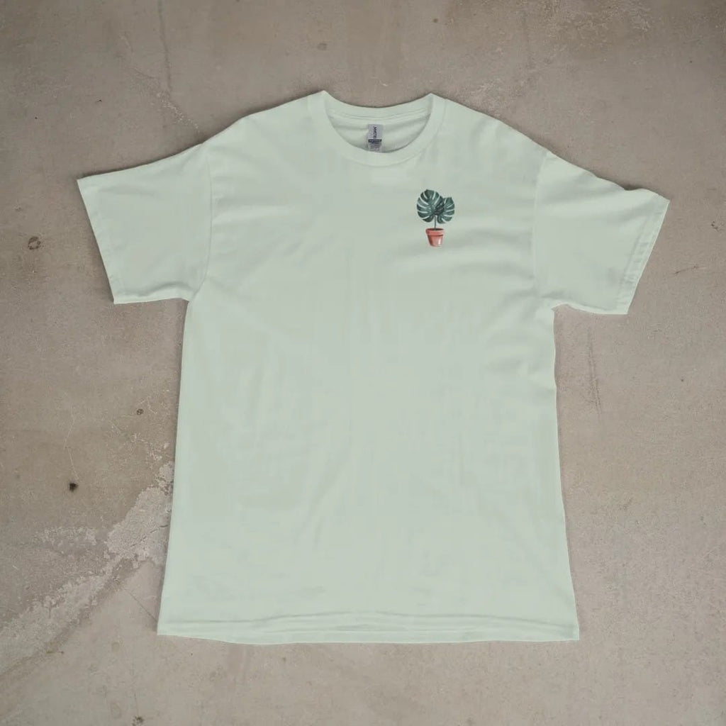 Front of a Bay tee laid flat, with the small Plant Parent Co. logo on the left chest.