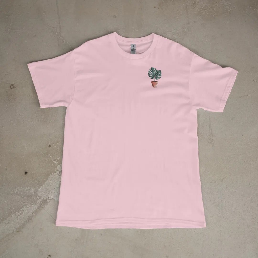 Front of a Blossom tee laid flat, with the small Plant Parent Co. logo on the left chest.