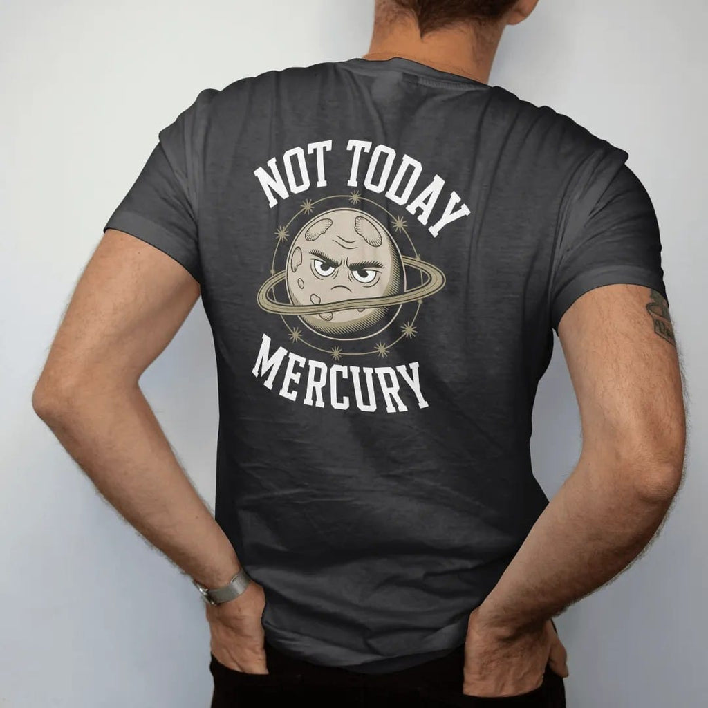 Man wearing a Black tee, seen from the back: back print: A tiny cratered planet with a grumpy face, circled by orbit lines and stars, stacked "NOT TODAY" above and "MERCURY" below, detailed vintage etching, fine crosshatching and stippling, elegant…