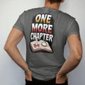 Man wearing a Pepper tee, seen from the back: a melted candle stub on an open book next to a cracked pocket watch with One More Chapter stacked above and below, in pulp halftone cream, red, yellow and blue.