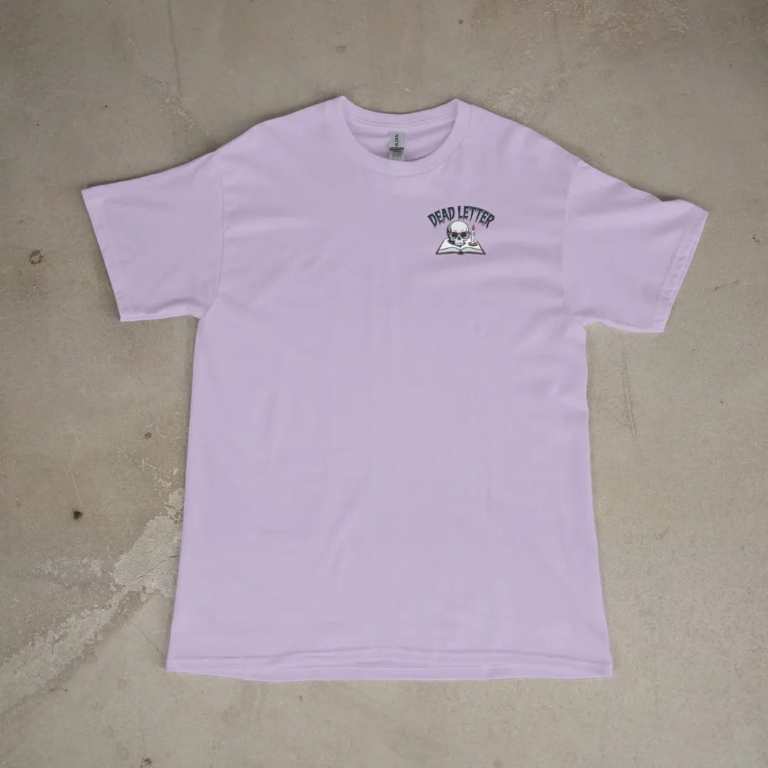 Front of a Orchid tee laid flat, with the small Dead Letter Book Club logo on the left chest.