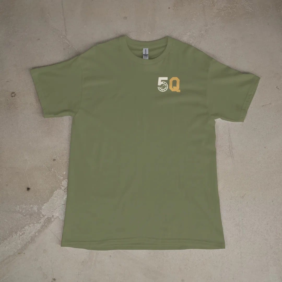 Front of a Moss tee laid flat, with the small Fifth Quarter Tailgate logo on the left chest.