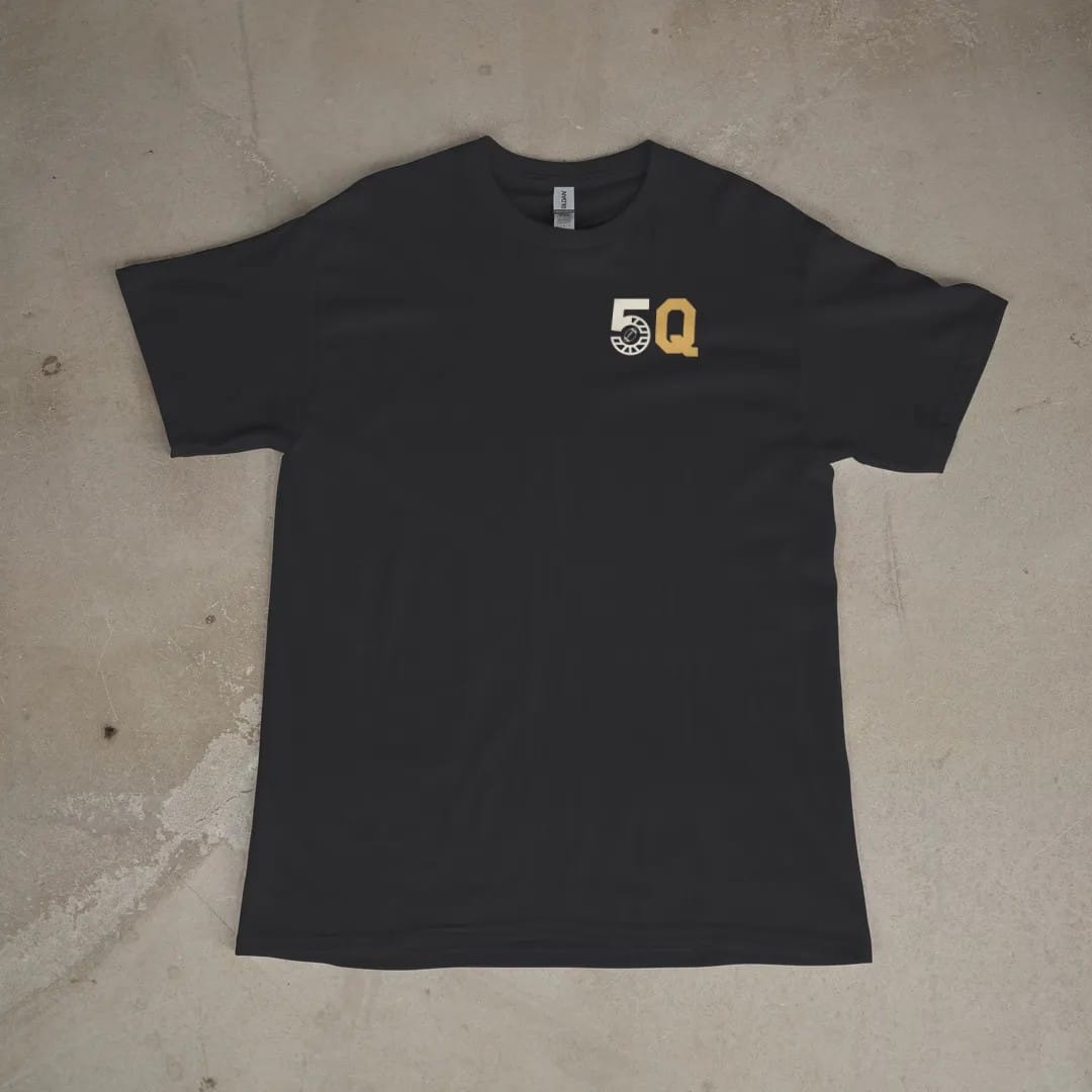 Front of a Black tee laid flat, with the small Fifth Quarter Tailgate logo on the left chest.