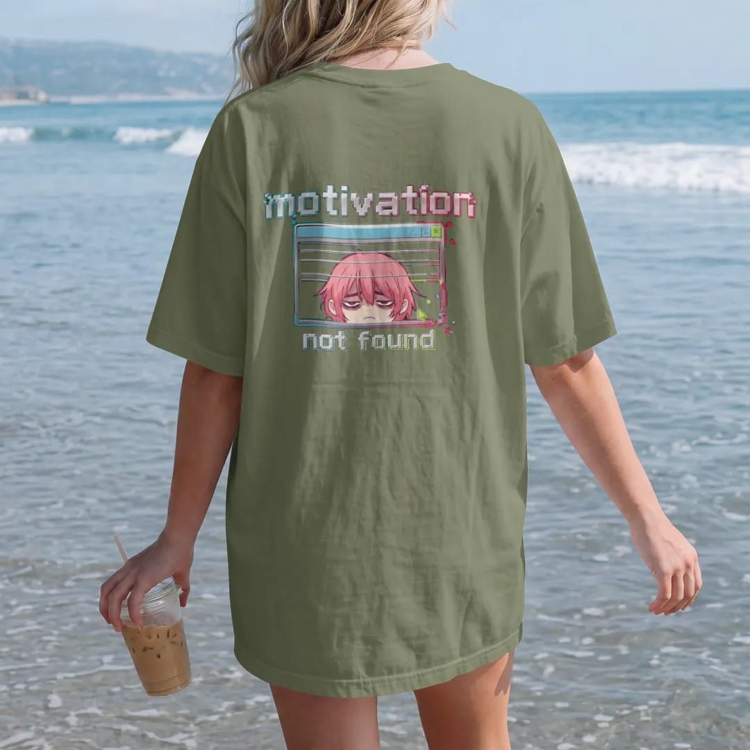 Woman on the beach in a Moss tee, back view: a glitching retro pop-up window with a tired anime-style face peeking out, under motivation in glitch pixel letters with not found below, in lime, pink, blue and silver.