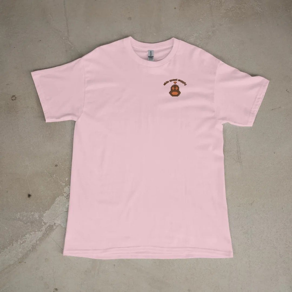 Front of a Blossom tee laid flat, with the small Side Quest Supply logo on the left chest.