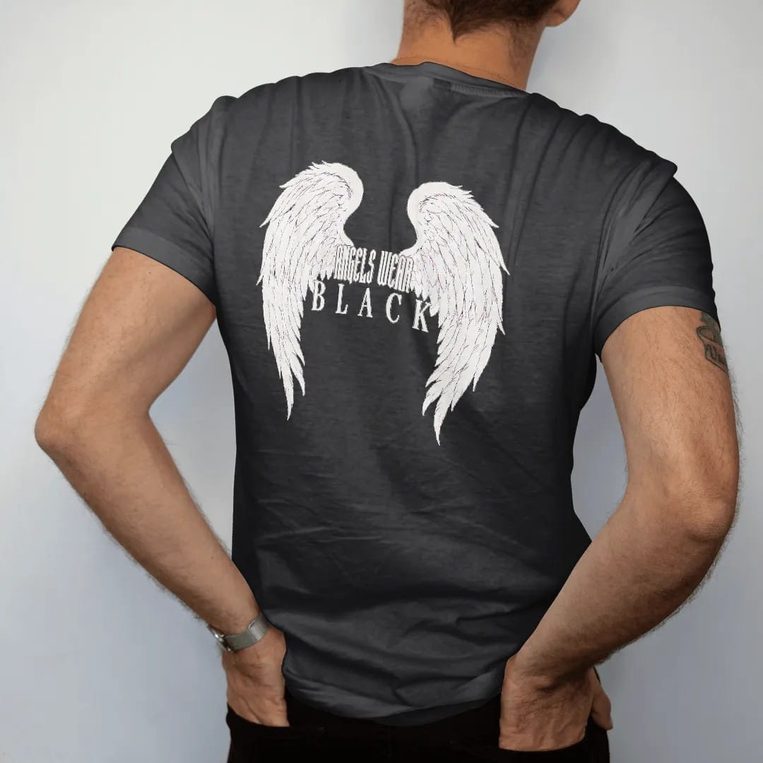 Man wearing a Black tee, seen from the back: a huge pair of spread engraved angel wings with Angels Wear in gothic blackletter between them and Black in spaced serif capitals beneath, in single-ink bone cream.