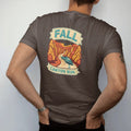 Man wearing a Espresso tee, seen from the back: a generic sports coupe carving a canyon road through orange and gold trees with swirling leaves, Fall Canyon Run lettering, in cream, burnt orange, yellow and teal.