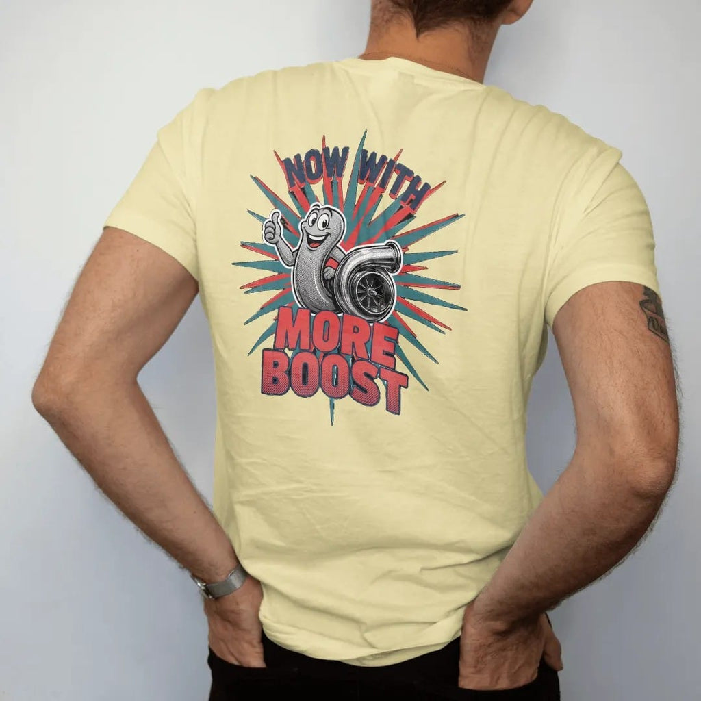 Man wearing a Butter tee, seen from the back: a vintage-ad turbo snail mascot giving a thumbs up beside a turbocharger on a starburst, Now With More Boost lettering, in navy, rally red, teal and charcoal.