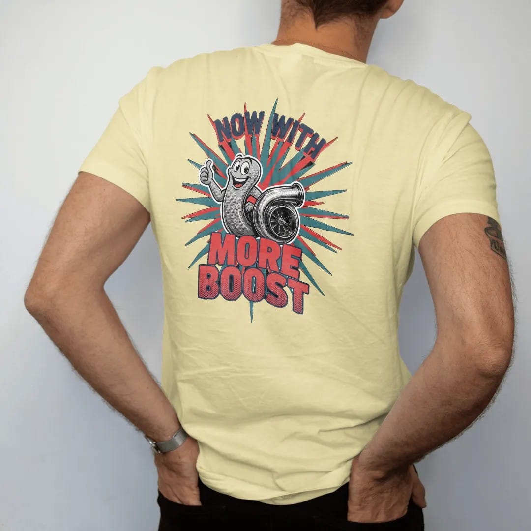 Man wearing a Butter tee, seen from the back: a vintage-ad turbo snail mascot giving a thumbs up beside a turbocharger on a starburst, Now With More Boost lettering, in navy, rally red, teal and charcoal.