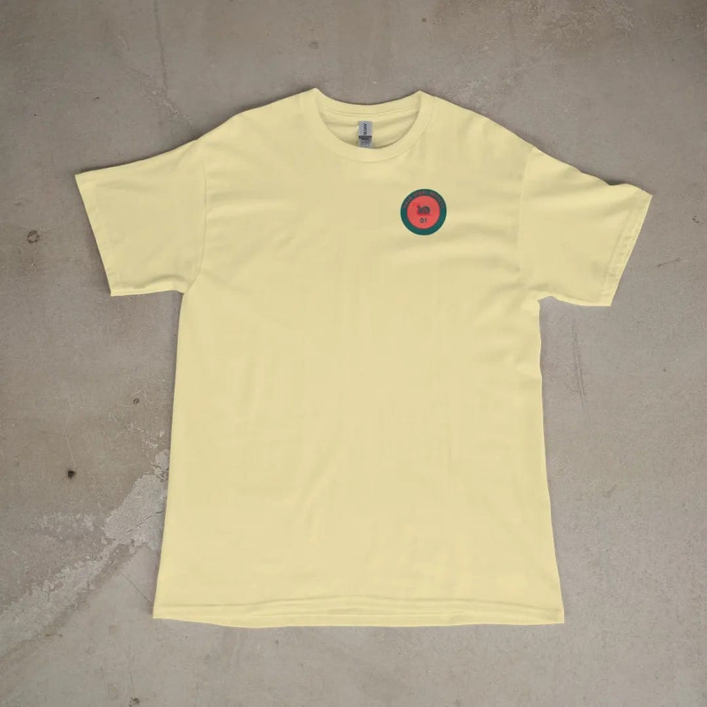 Front of a Butter tee laid flat, with the small Cold Start Society logo on the left chest.