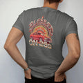 Man wearing a Pepper tee, seen from the back: a boxy 80s sedan with a giant glowing chrome rim behind it like a halo, under Blessed and over On 26s, in red, silver, orange and lime.
