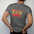 Man wearing a Pepper tee, seen from the back: a retro car-show flyer with a boxy 80s sedan on big rims between palmettos, with Sunday Show on top and Bring The Box below.