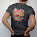 Man wearing a Black tee, seen from the back: a 90s airbrush style scene of a boxy 80s sedan sitting high on a marsh road at sunset with palmettos, under Lowcountry and over Sittin' High.
